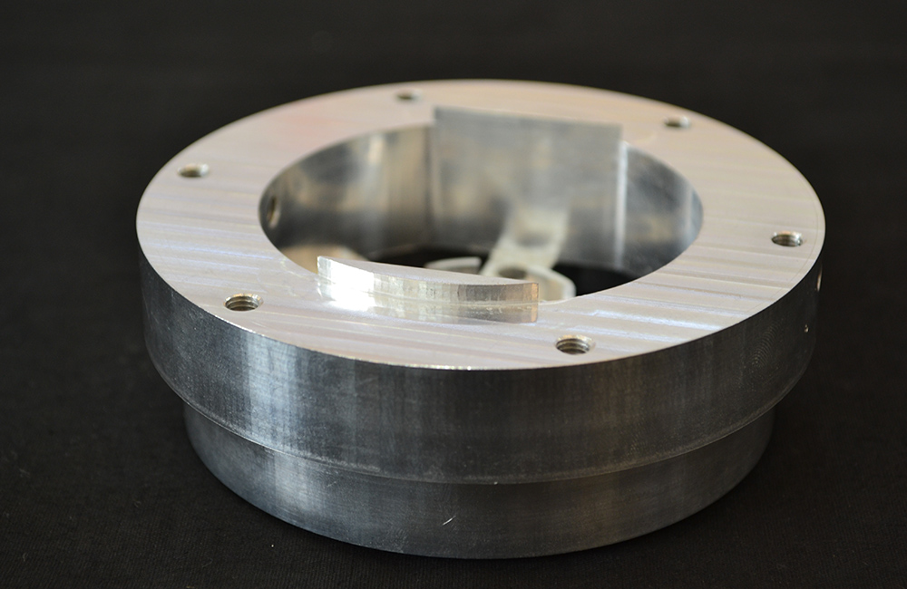 What is the difference between CNC and machining center?